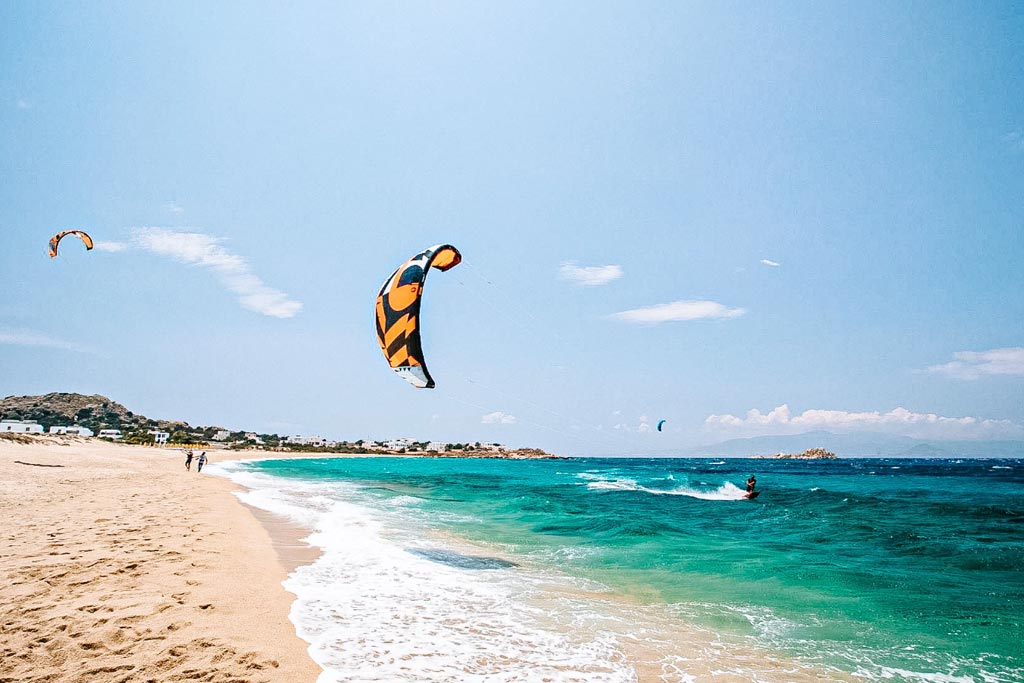 Kite surfers enjoying the beach and waves. Olives Seaside Villas, Plaka, Naxos